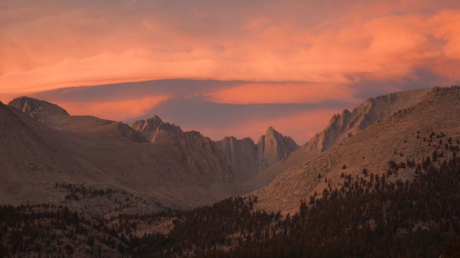Sunset with dramatic clouds over mount whitney on the pacific crest trail in the usa.