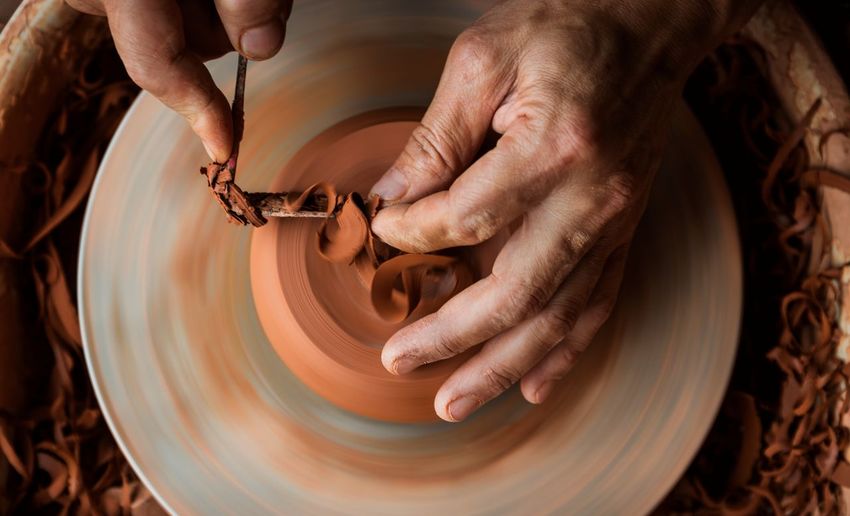 Cropped image of making earthenware