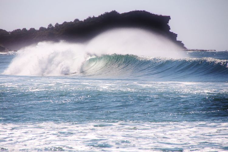 Waves splashing on rocks