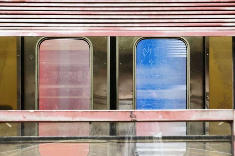 Building reflecting in water