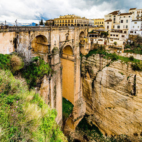 The new bridge or puente nuevo over the guadalevin river, the town of ronda on the plateau
