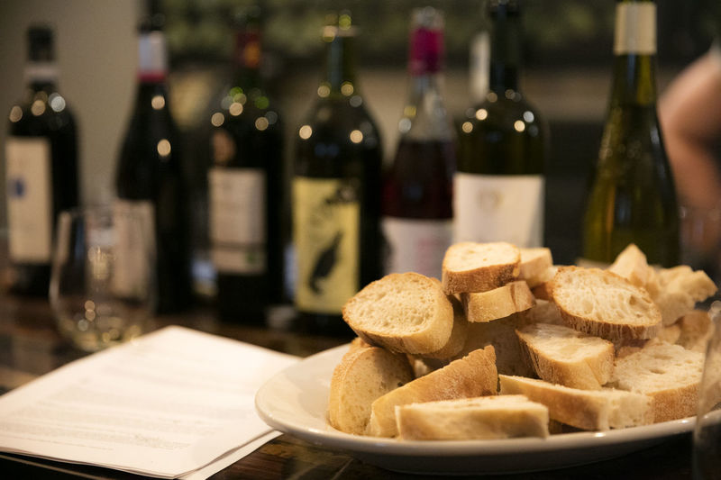 Close-up of wine bottles on table