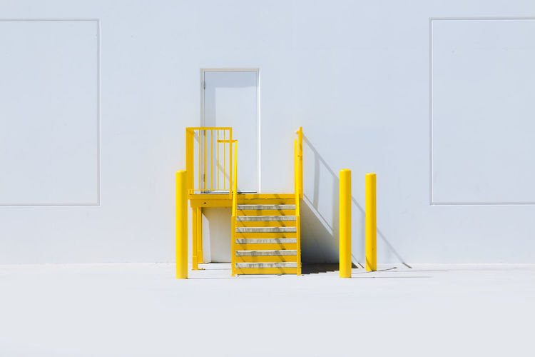 Clear Sky Copy Space Entrance Stairs Absence Architecture Building Built Structure Chair Clean Copy Space Day Door Empty Entrance Indoors Ladder Minimalism No People Seat Staircase Still Life Wall - Building Feature Warehouse Wood - Material Yellow The Architect - 2018 EyeEm Awards