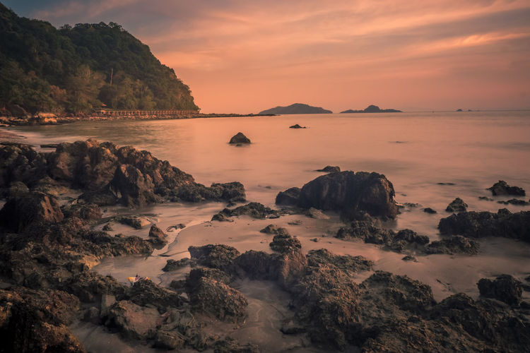 Scenic view of sea against sky during sunset