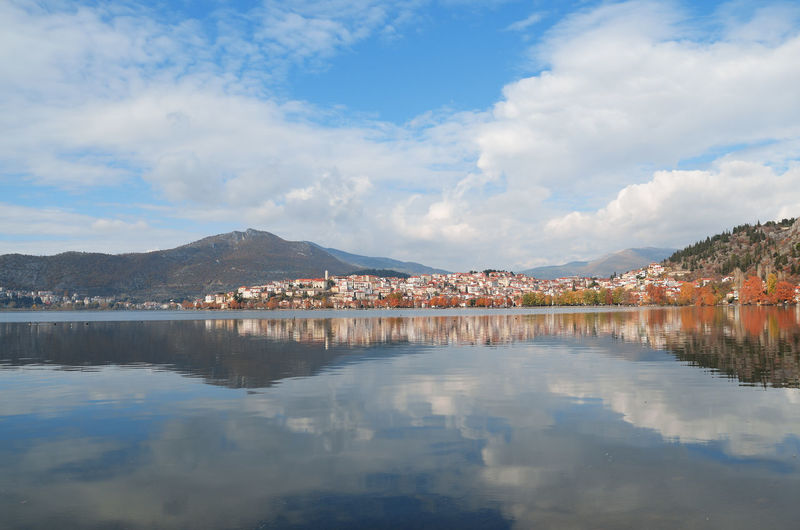 Autumn cityscape of kastoria with reflection on the lake