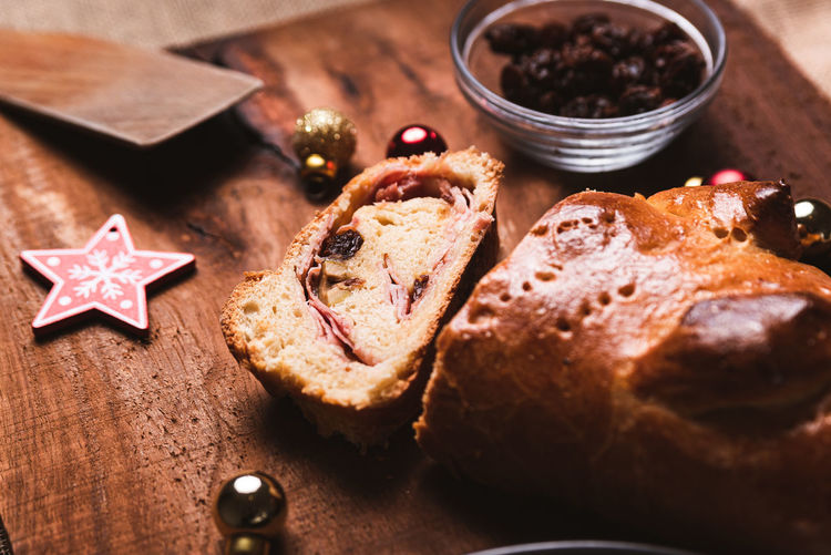 A slice of traditional venezuelan christmas food known as pan de jamon meaning ham with bread