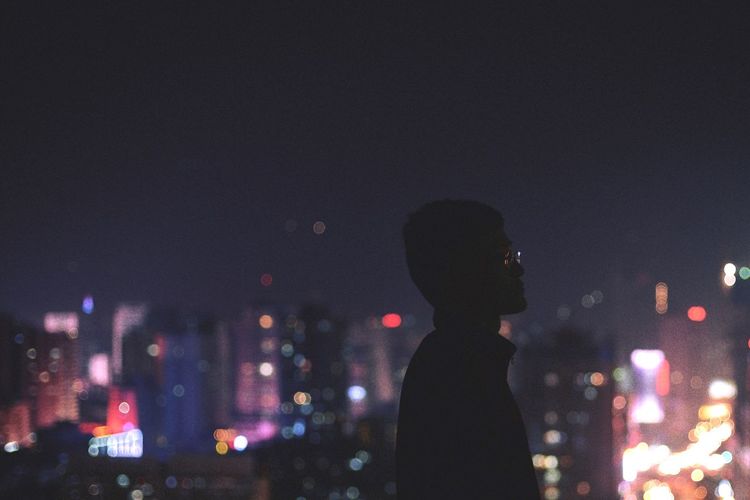 Illuminated cityscape at night