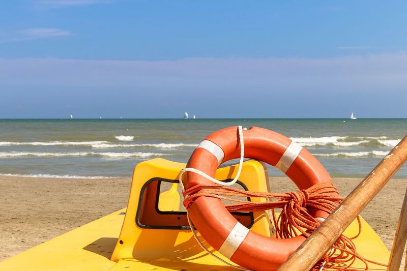 Lifebuoy on a lifeboat by the sea, italy, riccione