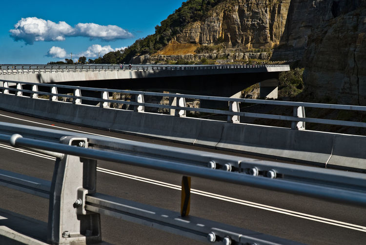 View of bridge against cloudy sky