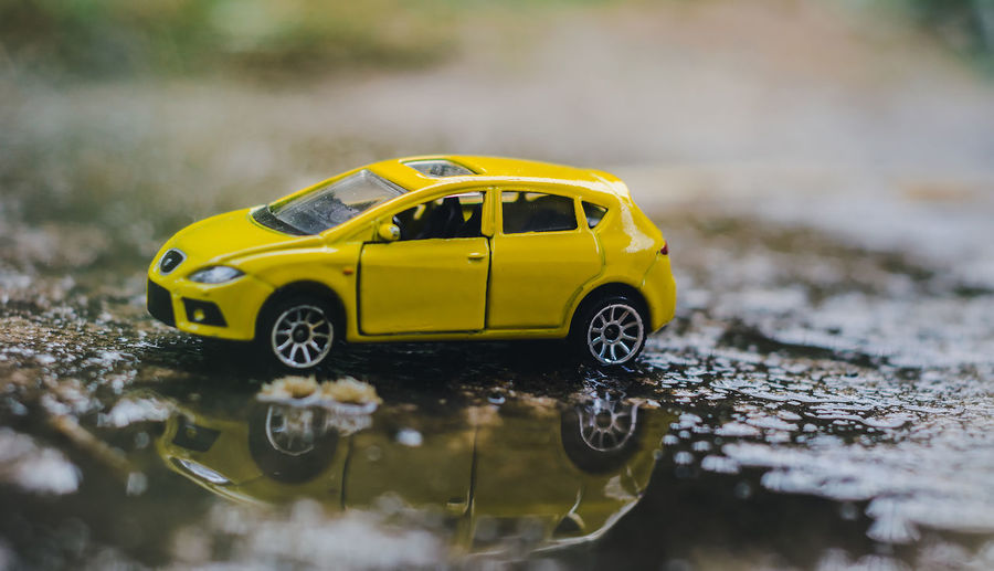 Close-up of yellow toy car