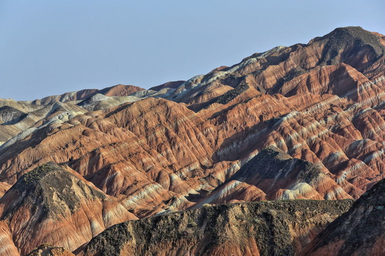 0884 rusty sandstone and siltstone landforms-zhangye danxia nnal.geological park. gansu prov.-china.
