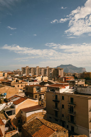 The view over city with old buildings and roofs , architecture in palermo.