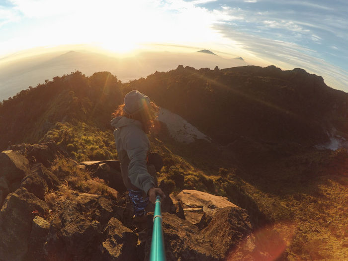 Selfie from the summit of mount sumbing 3371 meters above sea level at sunrise