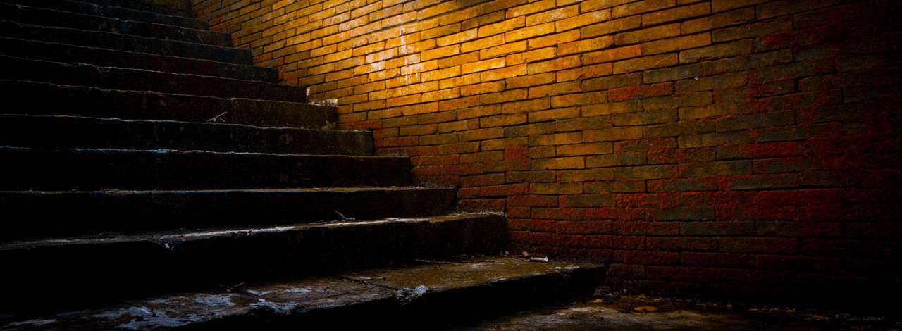 Low angle view of old wall