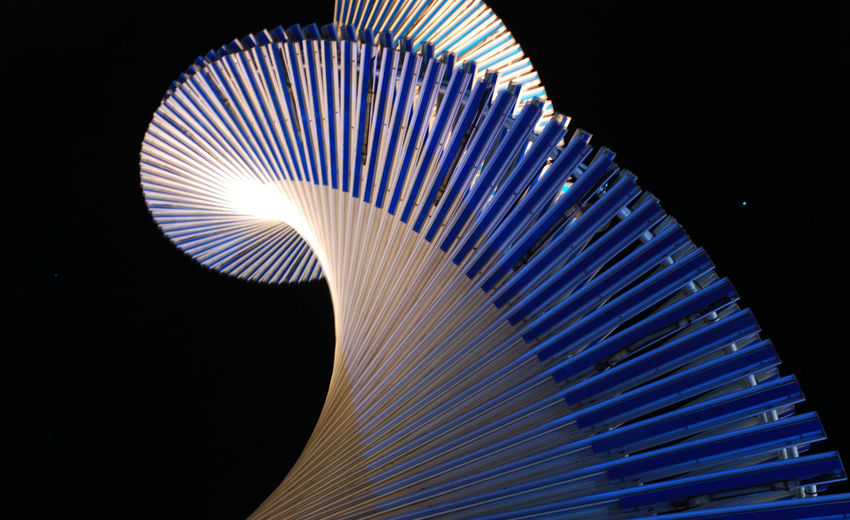 Low angle view of illuminated ferris wheel
