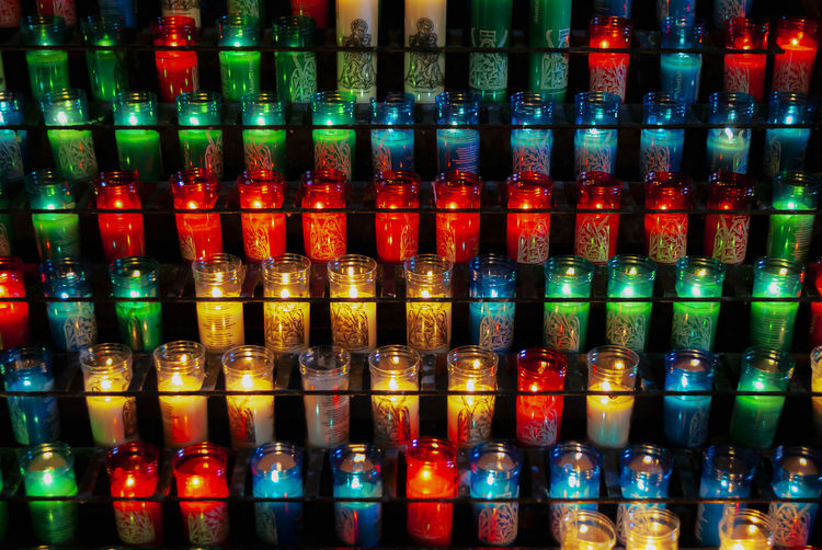 Full frame shot of multi colored glass bottles