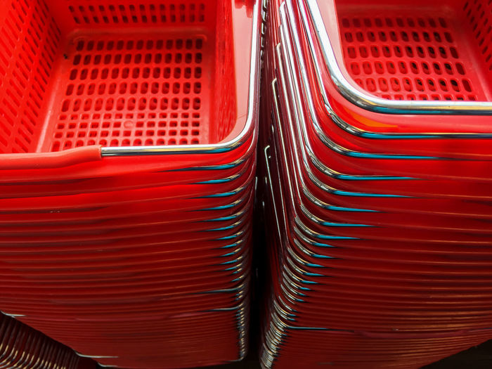 High angle view of red stacked crates