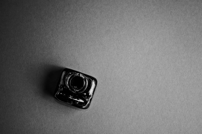 High angle view of camera on table
