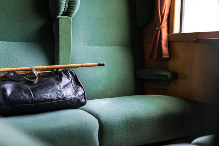 The seat next to the black bag