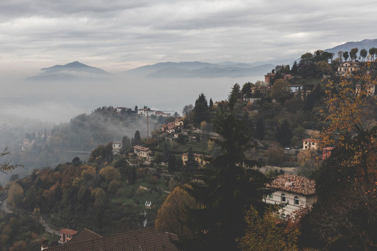 A foggy morning in the foothills of the alps around the city of bergamo.