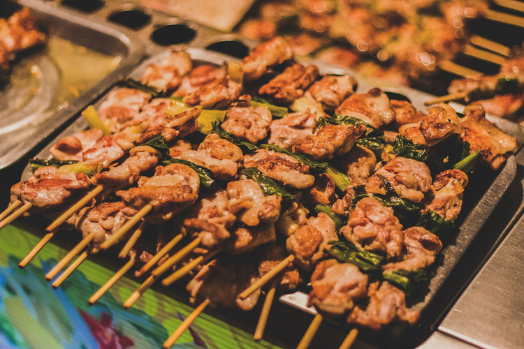 Close-up of grilled meat on skewers