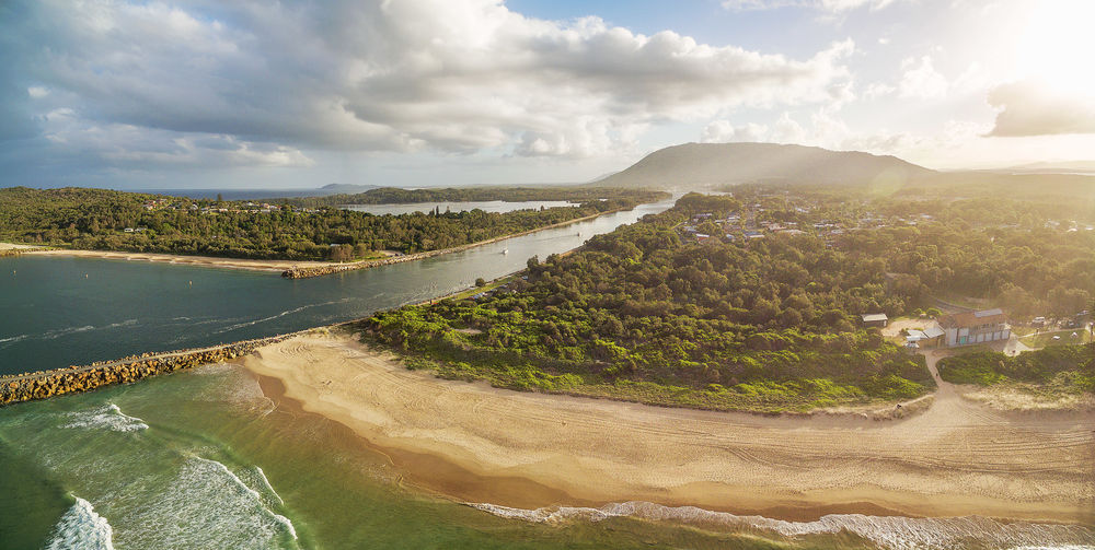 Camden haven inlet, north haven, nsw, australia - aerial panorama at sunset