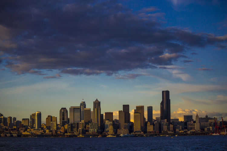 Seattle cityscape against dramatic sky