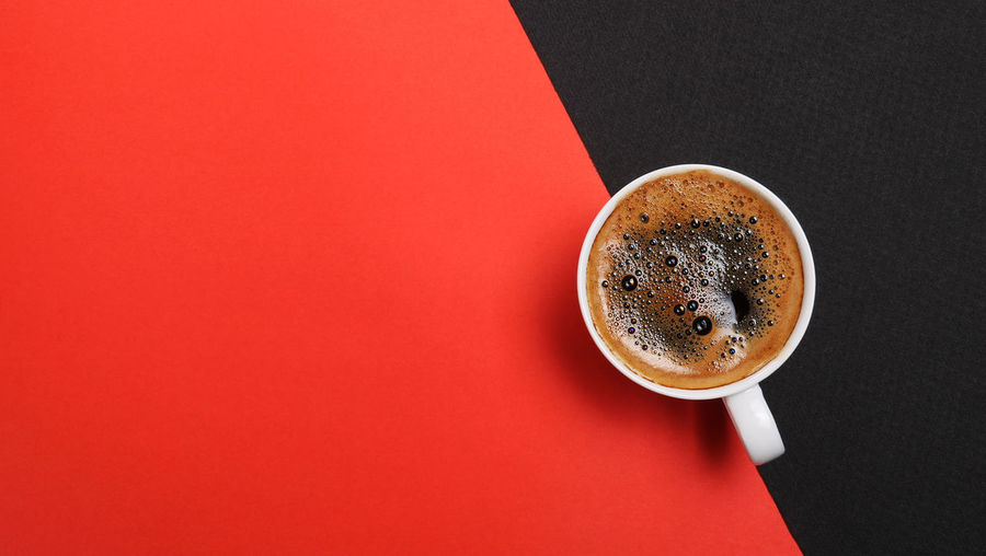 High angle view of coffee cup on table