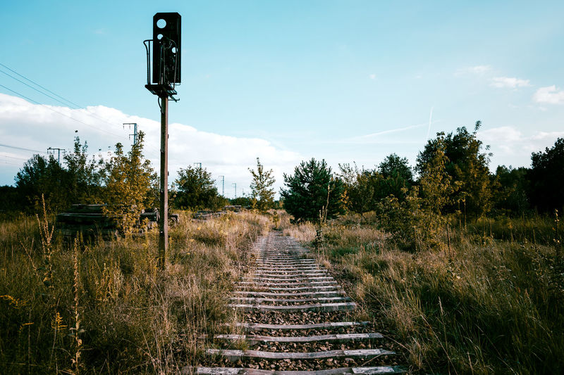 Railway tracks along countryside landscape