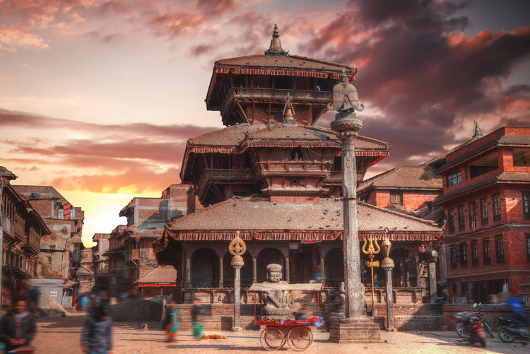 Low angle view of temple against sky during sunset