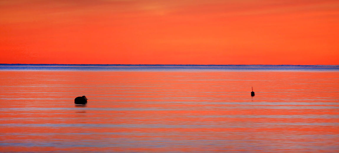 Orange sunset at chatham, cape cod
