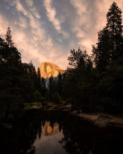 Half dome and unique cloud formations for sunset in yosemite national park - california
