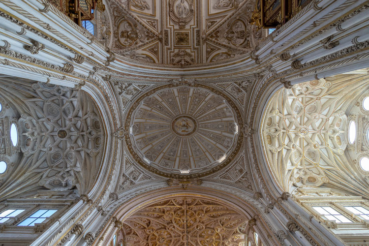 Low angle view of ornate ceiling of building
