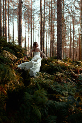 Woman sitting in a forest