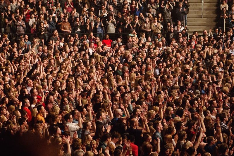 Fans applauding during popular music concert